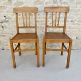 Pair of bistro chairs with perforated seat