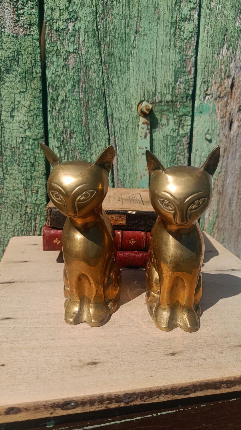 Gold-plated brass bookend cat