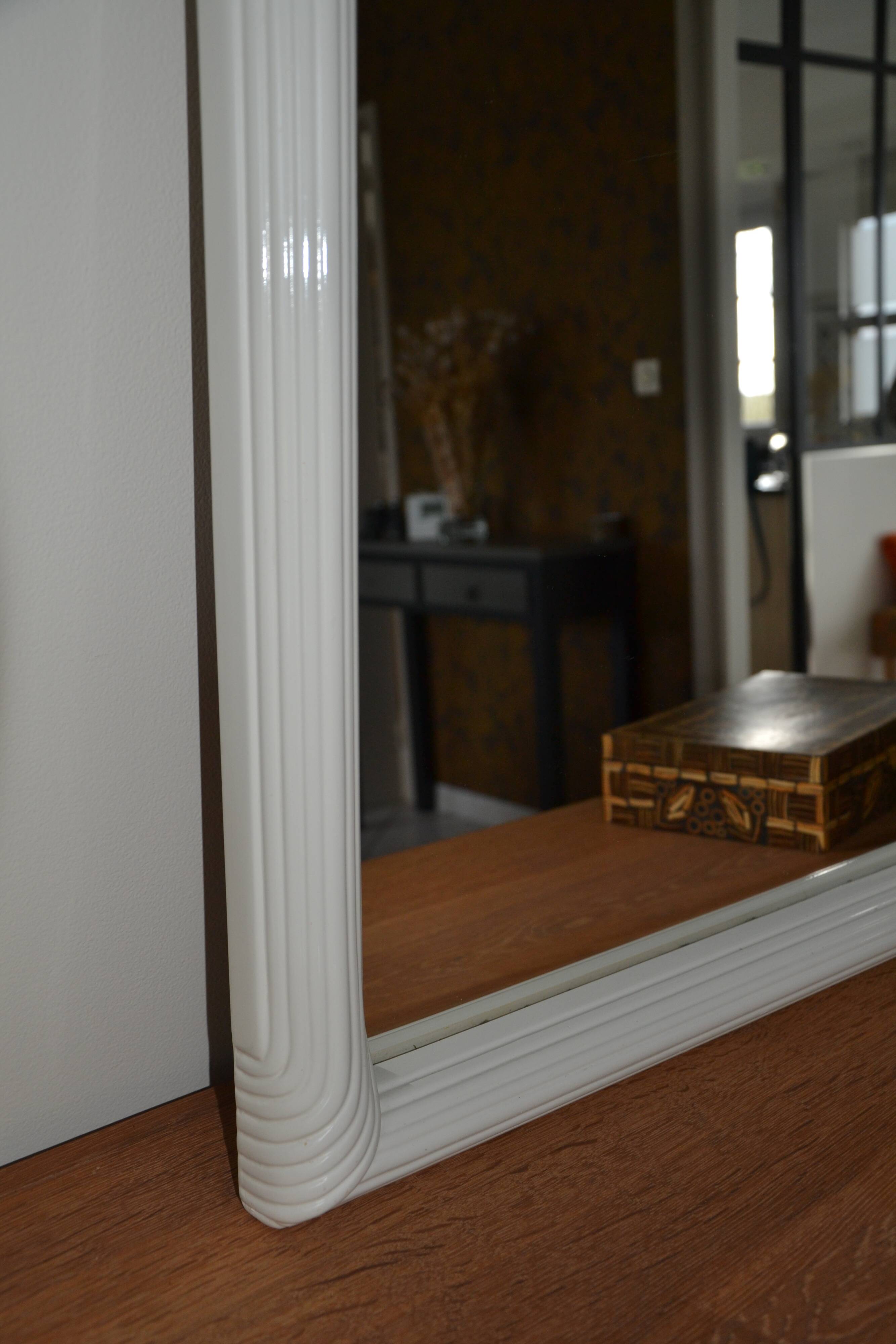 White mirror in 90s Art Deco style