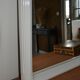 White mirror in 90s Art Deco style