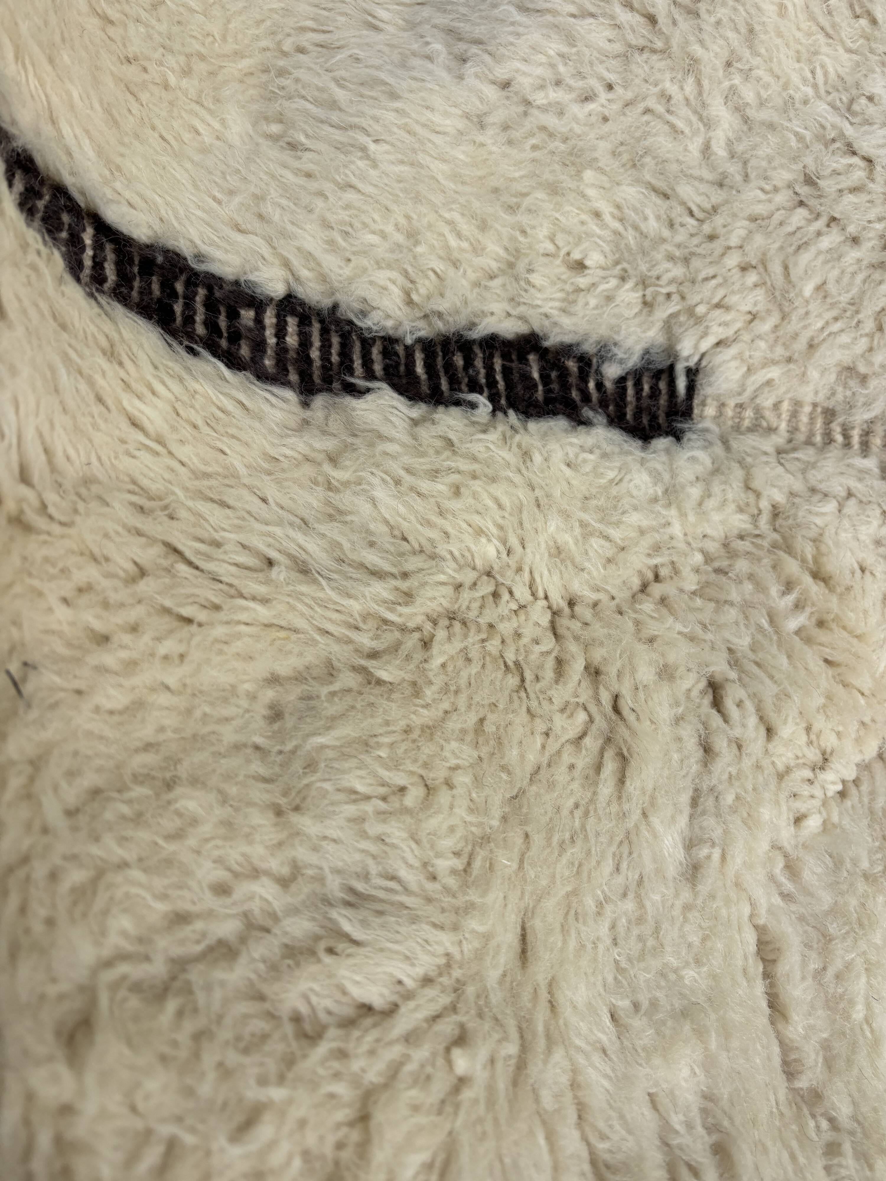 Large Berber M'rirt rug in cream and black wool, Moroccan rug.