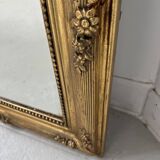 Miroir de style Louis XVI en bois et stuc doré XIX siècle