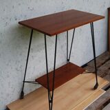 Tv furniture, a table with teak wheels and Scandinavian-style metal.