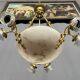 Art Deco chandelier. Marble, solid gilded bronze.