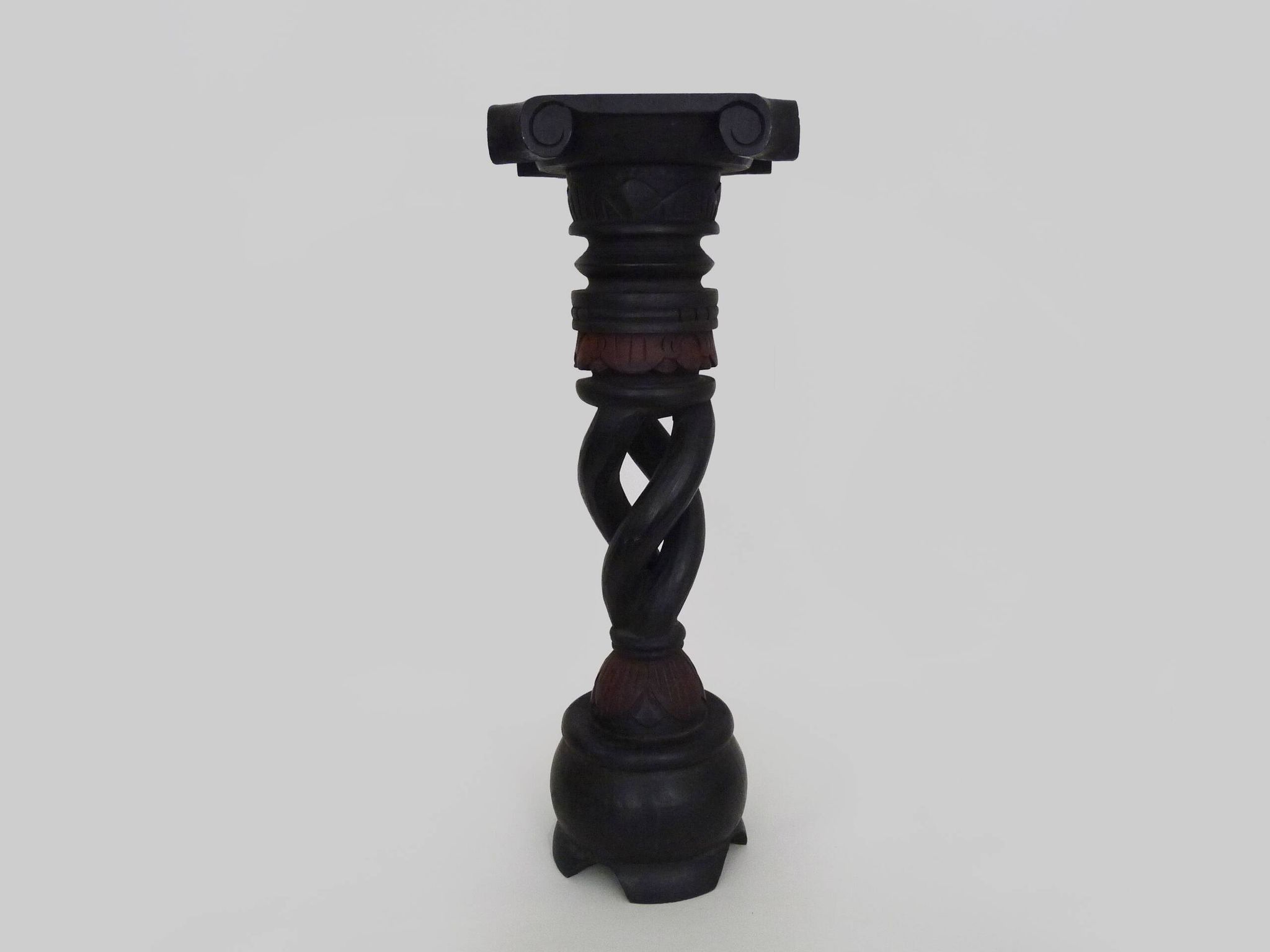 Twisted and engraved blackened wooden pedestal. 1960s 70s.