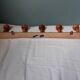 Bamboo-like wall coat rack with 5 mushroom hooks