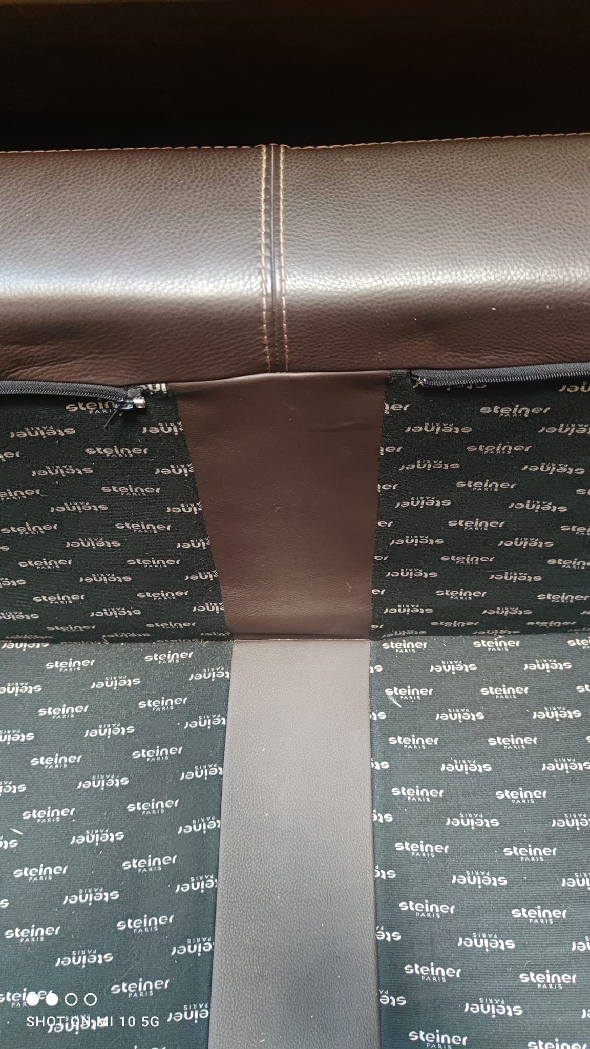 Four-seater sofa in dark brown leather from Steiner by designer Pascal Daveluy, model