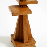 Two mid-century standing ashtrays consisting of red Alabaster cup