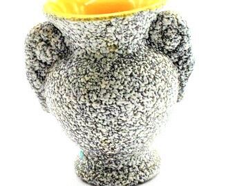 small ancient ceramic vase