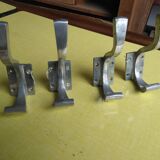Set of four aluminum coat hooks 1950