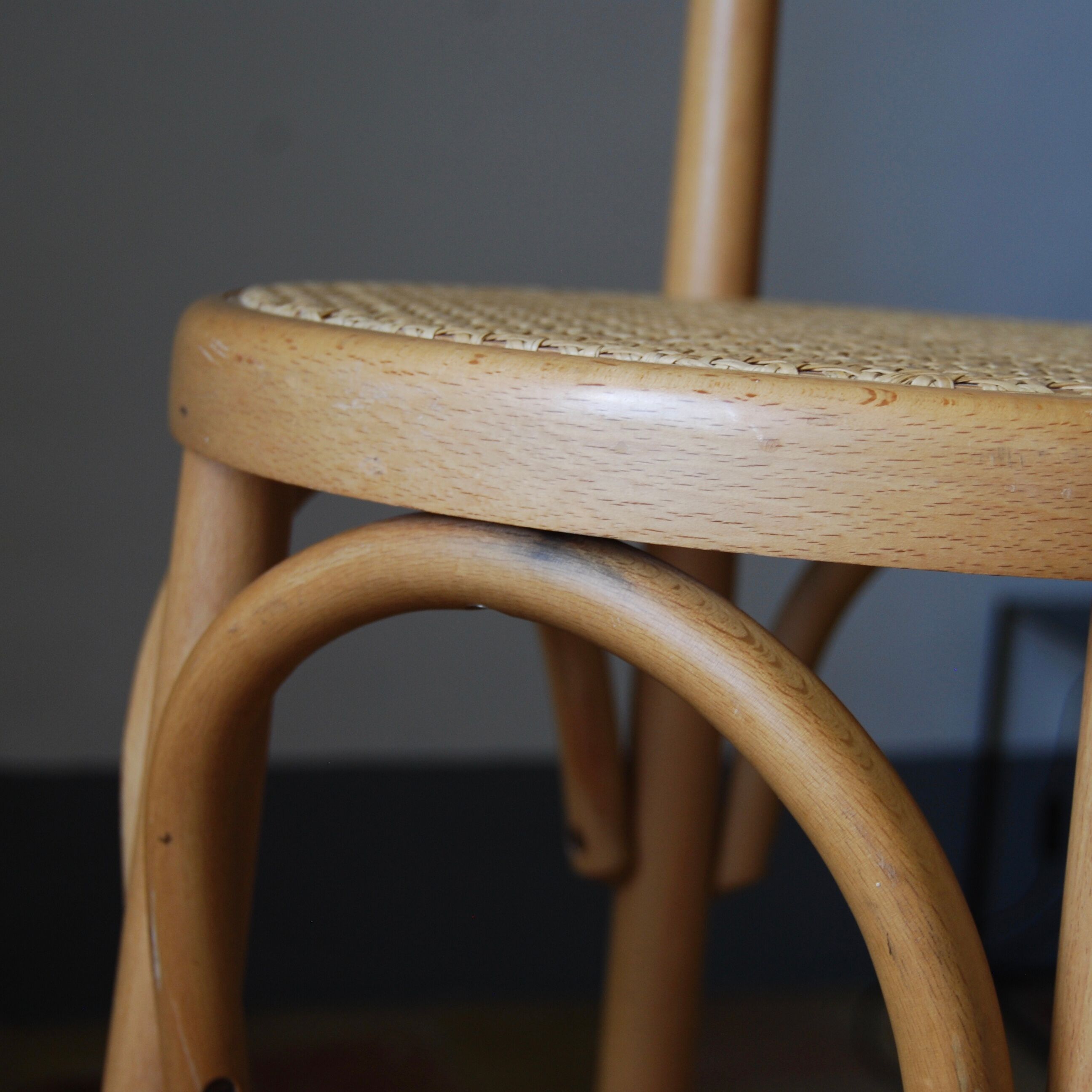 Wooden bar stools and cane