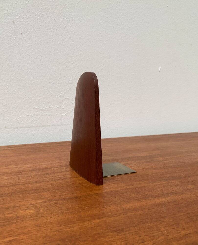 Mid-century Scandinavian bookends in teak and brass.