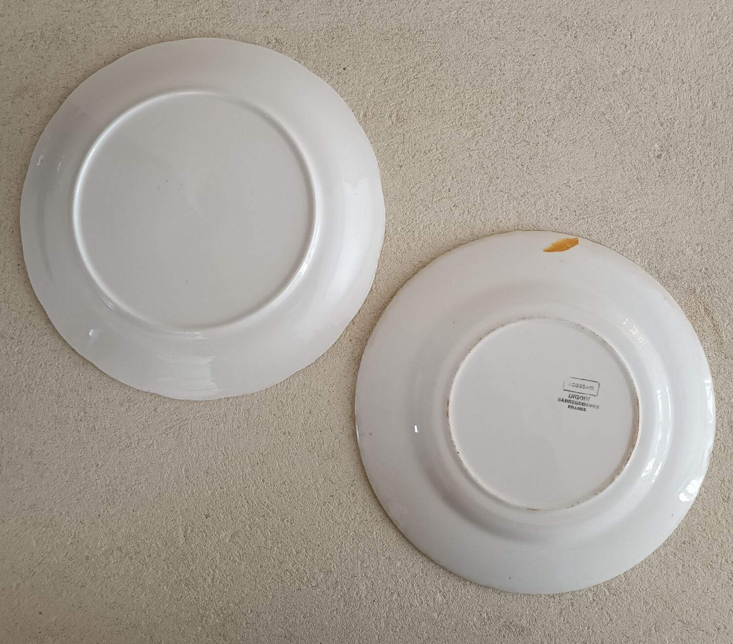 Set of 2 mismatched iron earth plates Digoin