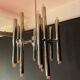 Scoliari chandelier with 18 bright nickel dots distributed by Boulanger