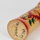 Decorative Naruko Kokeshi doll sculpture from northern Japan, hand-painted.
