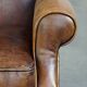 Fauteuil à oreilles en cuir de mouton