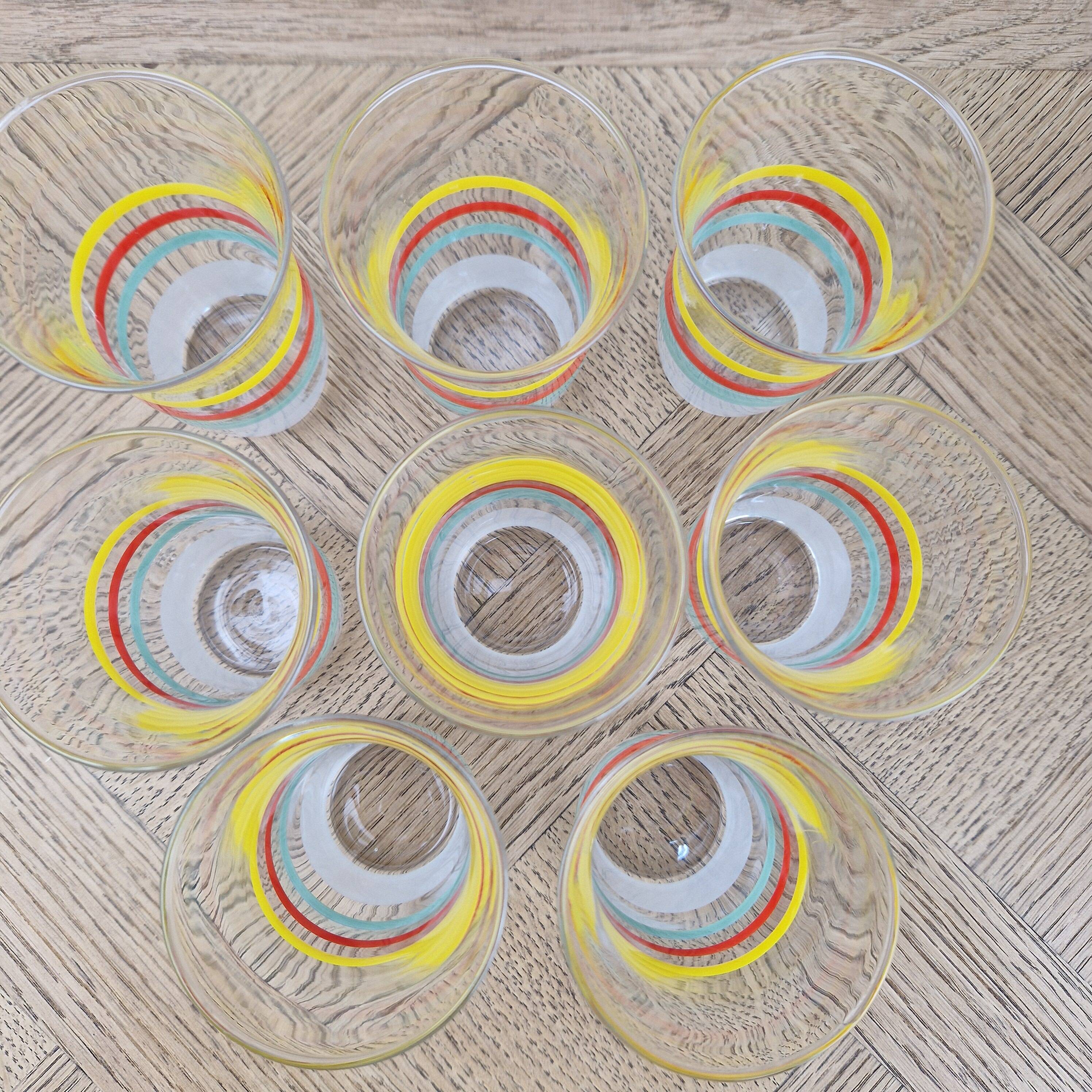 8 multicoloured vintage orangeade glasses from the 60s/70s.