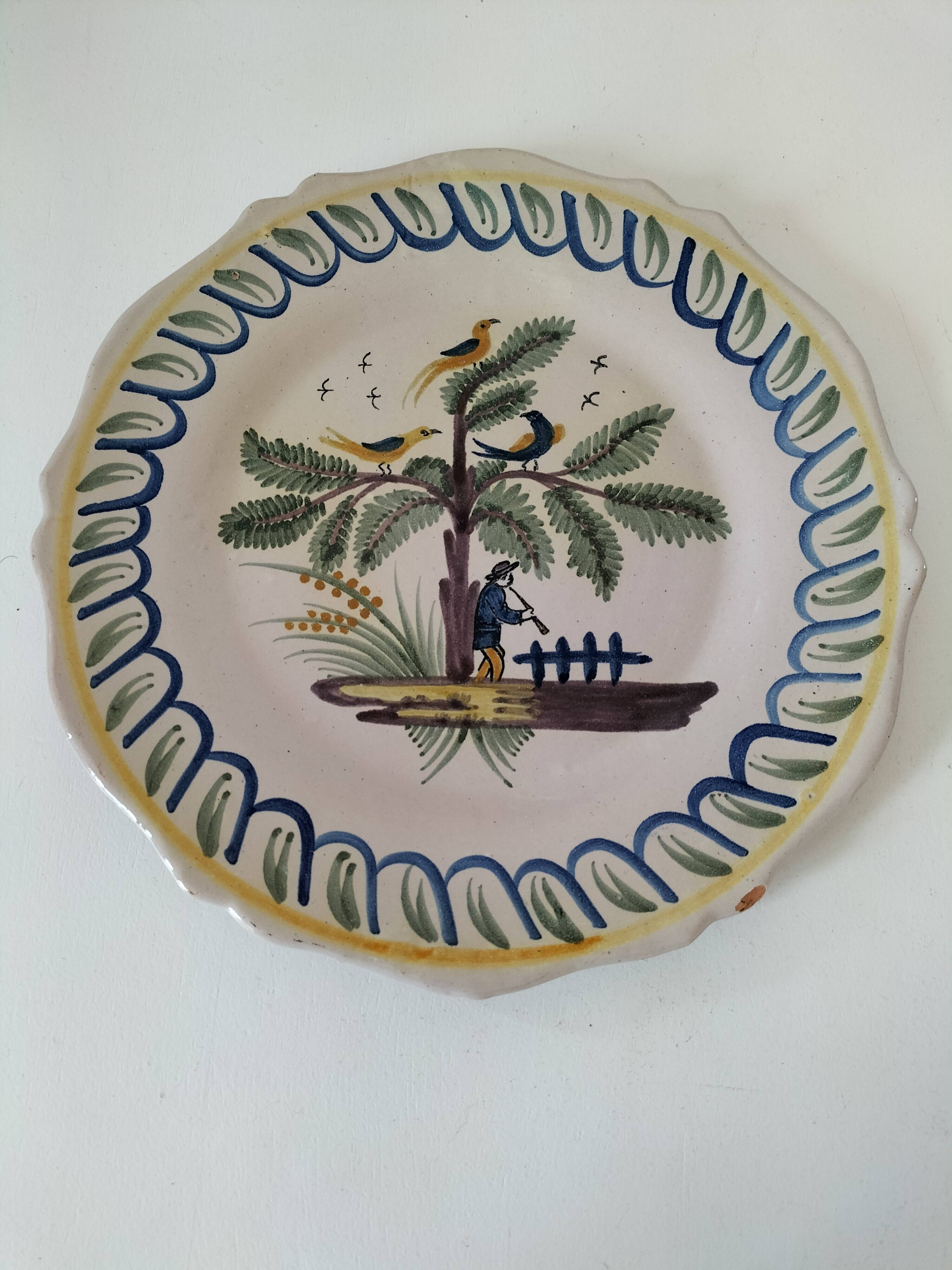 Antique hand-painted earthenware plate – piper and birds