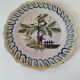 Antique hand-painted earthenware plate – piper and birds