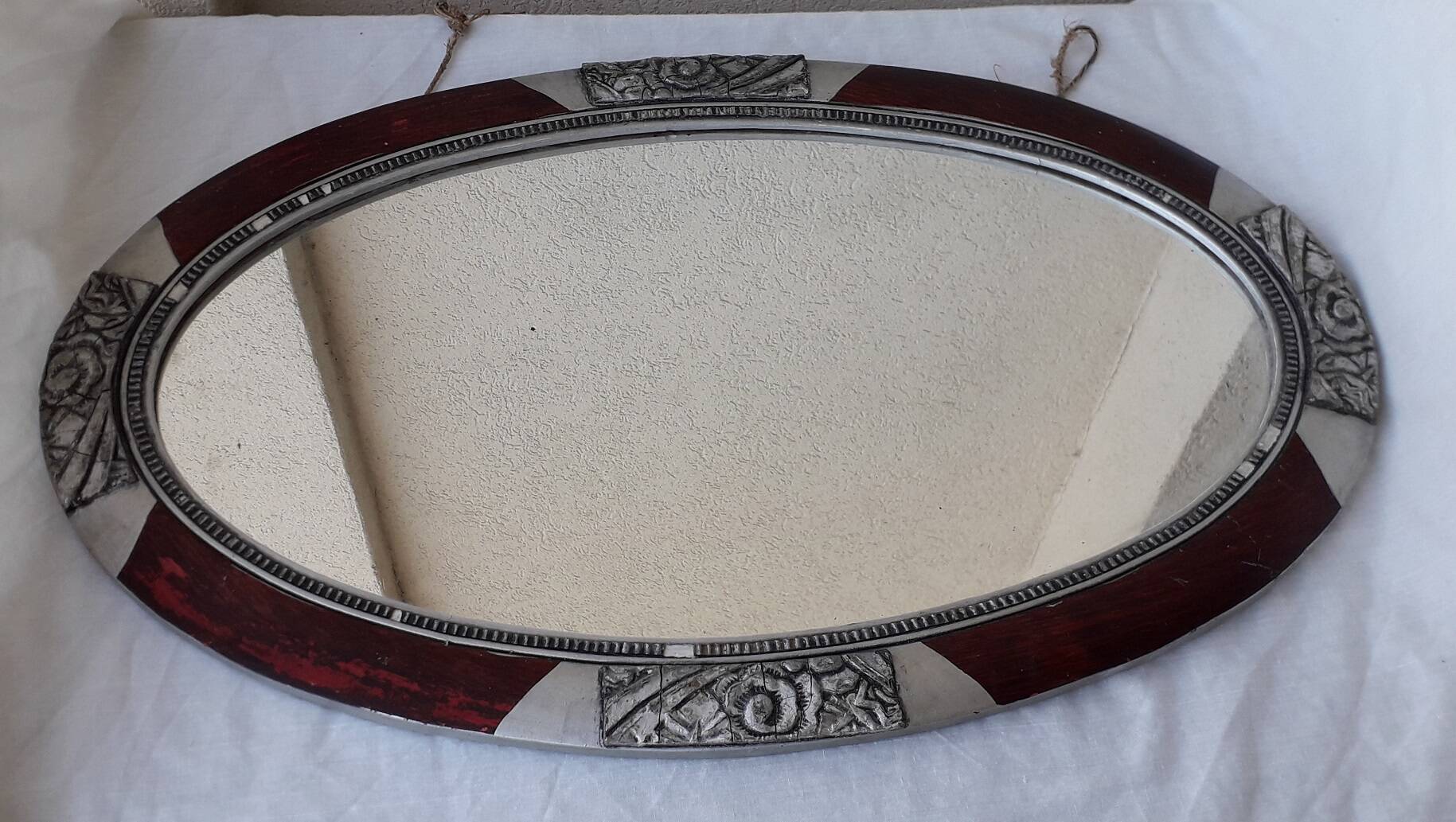 Oval wooden mirror