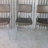 3 chaises simili cuir vert bronze et stucture chromée