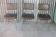 3 chaises simili cuir vert bronze et stucture chromée