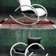 Rocking chair Memphis Ellipse leather Les Amisco with its cushion