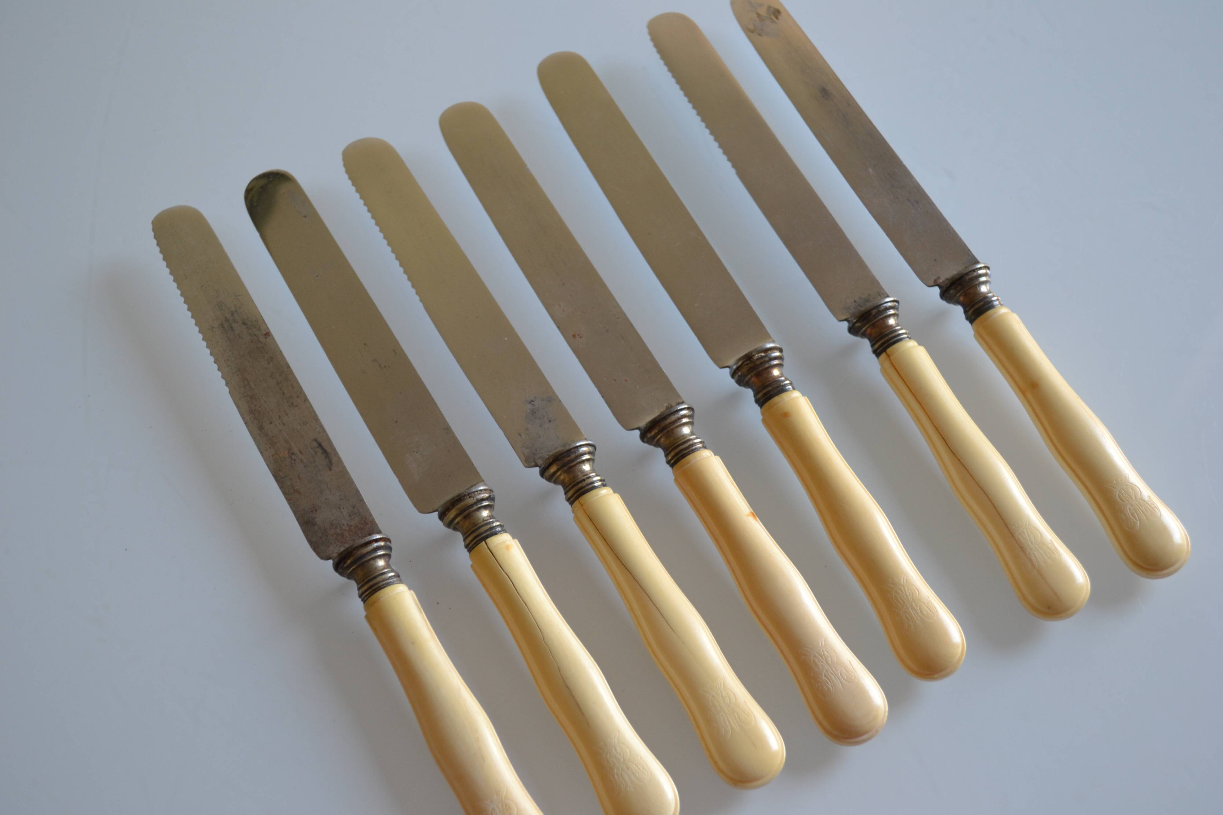 7 old table knives from the 19th century, monogrammed ivory-colored handles