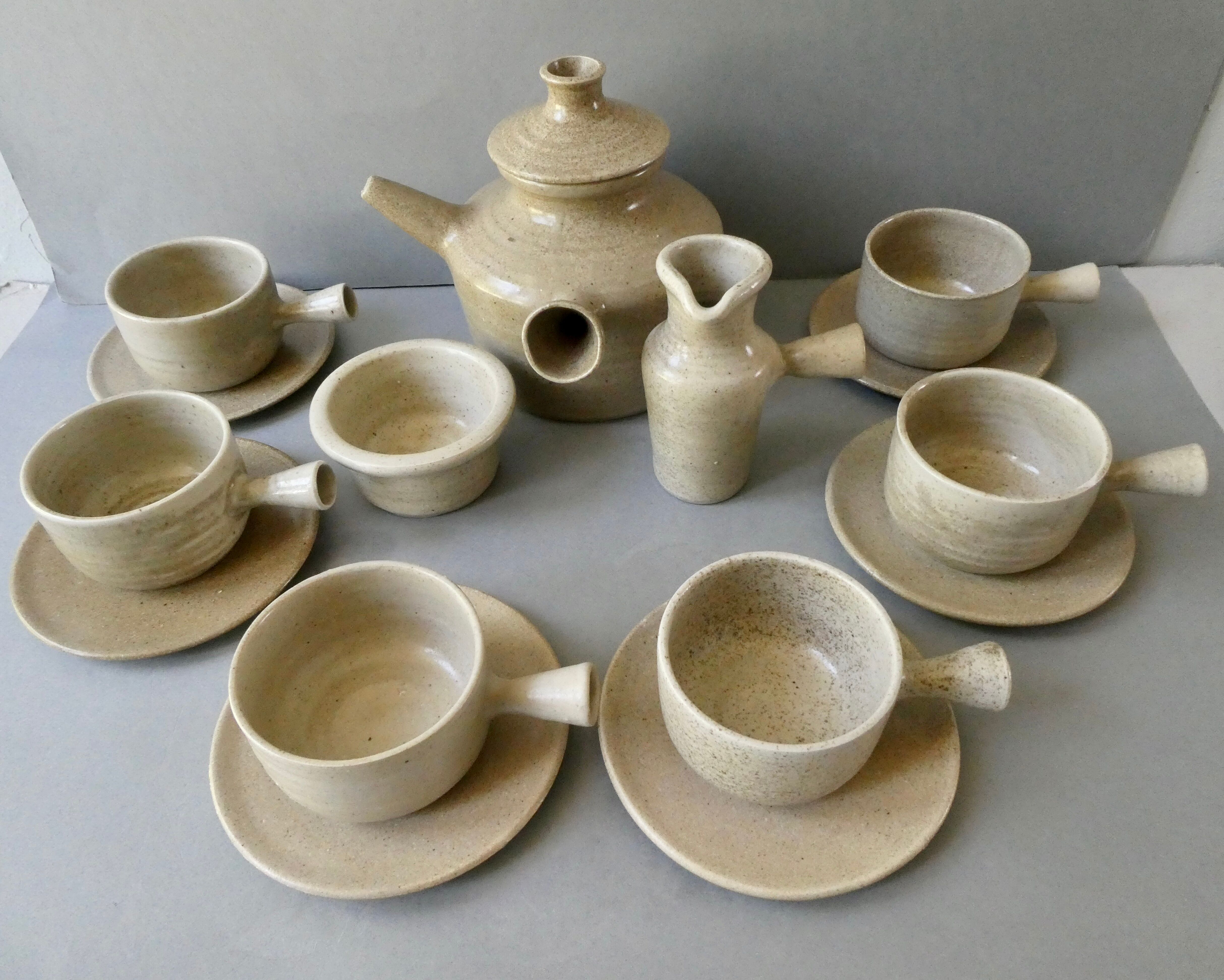Coffee or tea service, in sandstone, signed the Argonauts, 60s