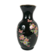 Black opal vase decorated with flowers