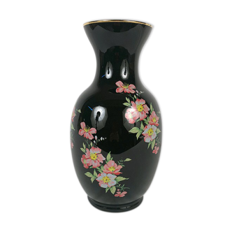 Black opal vase decorated with flowers