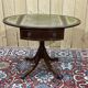 1950s English pedestal table in mahogany and leather top