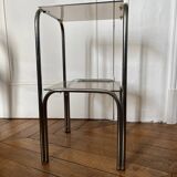 Chromed metal and smoked glass side table