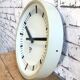 Beige industrial bakelite wall clock from Pragotron, 1970s