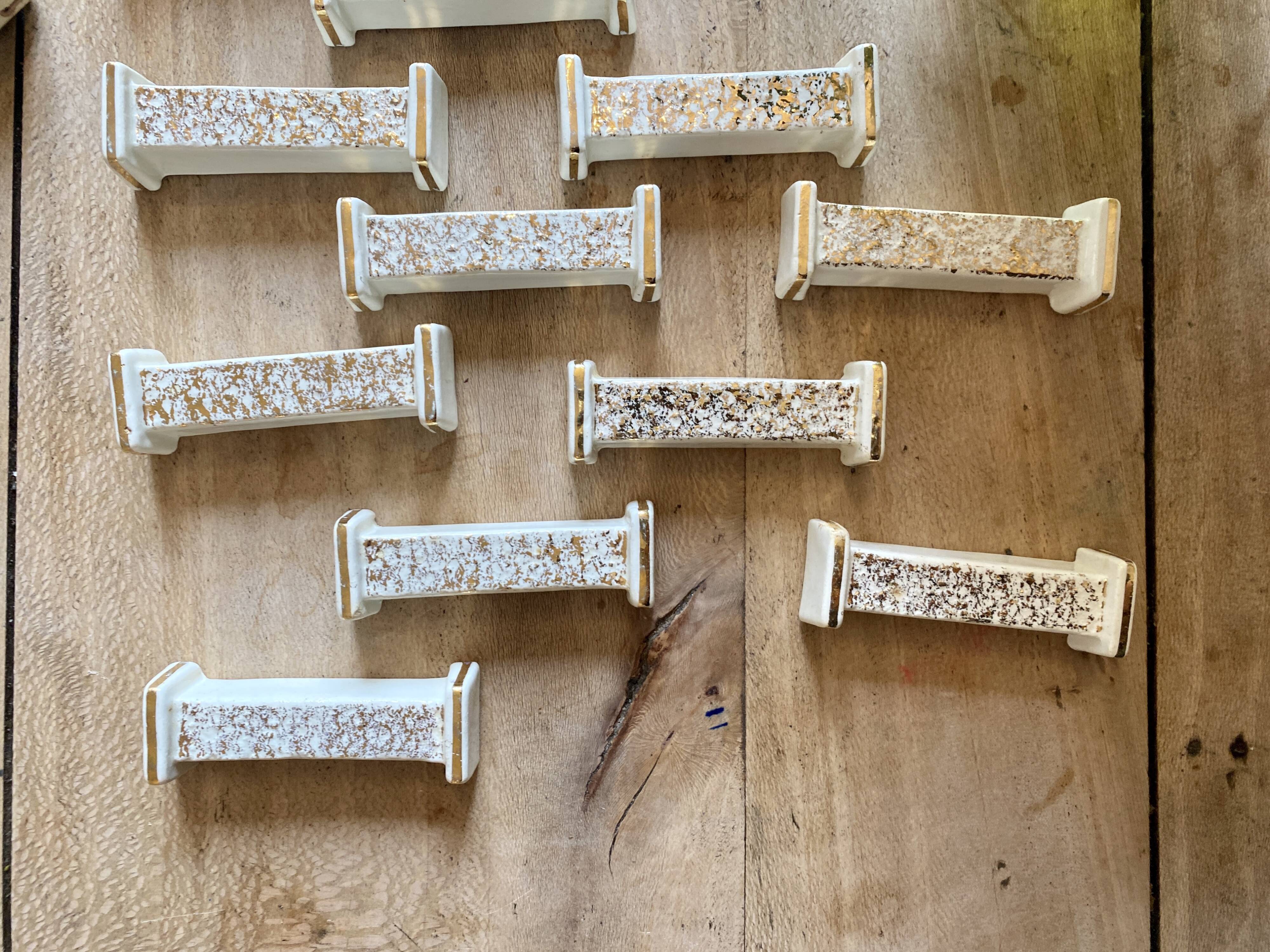Set of 10 vintage art deco knife holders in white and gold ceramic