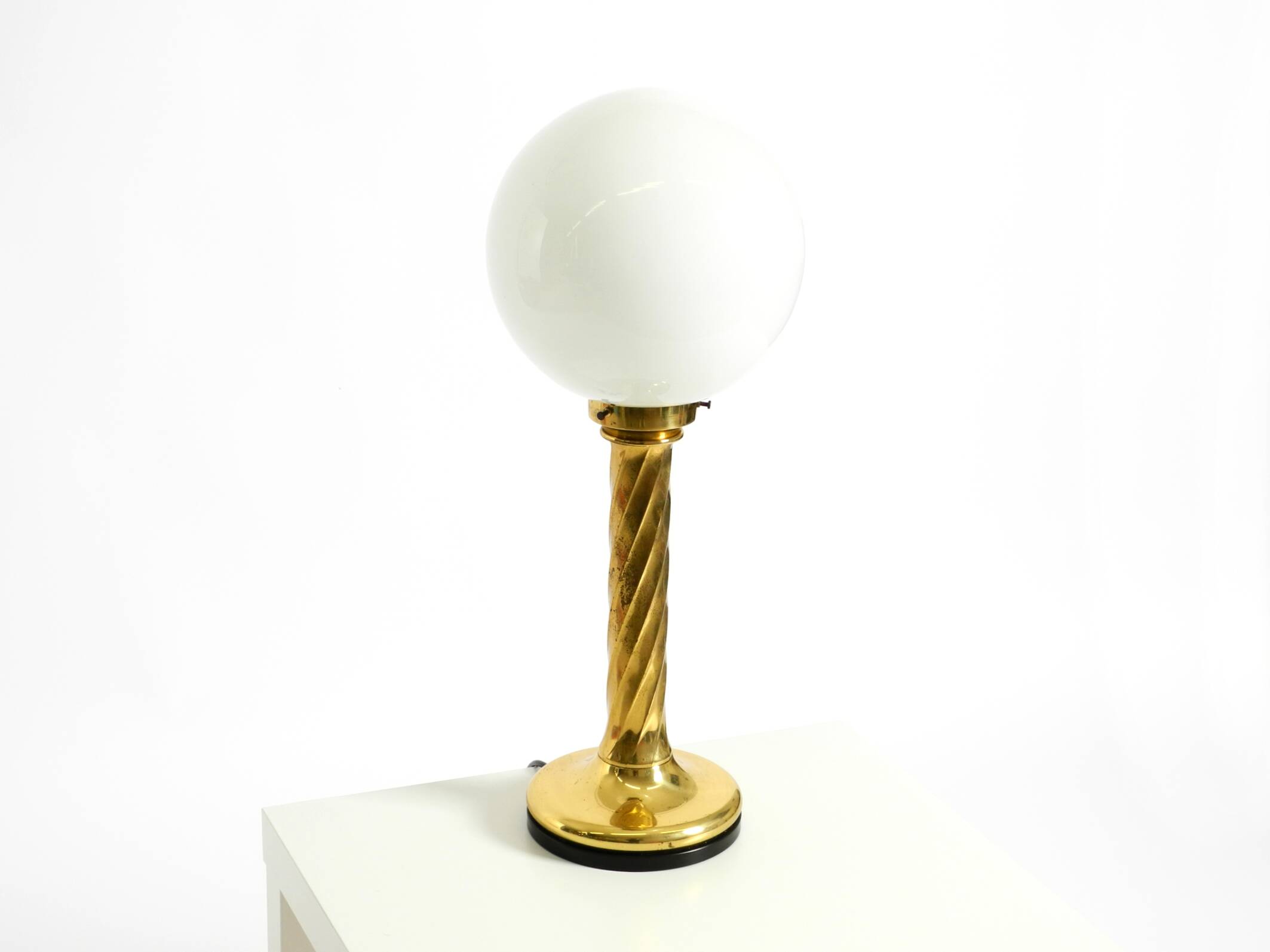 Large 1960s brass column-style table lamp with frosted glass globe