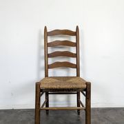 Series of 10 chairs in the style of Charlotte Perriand.