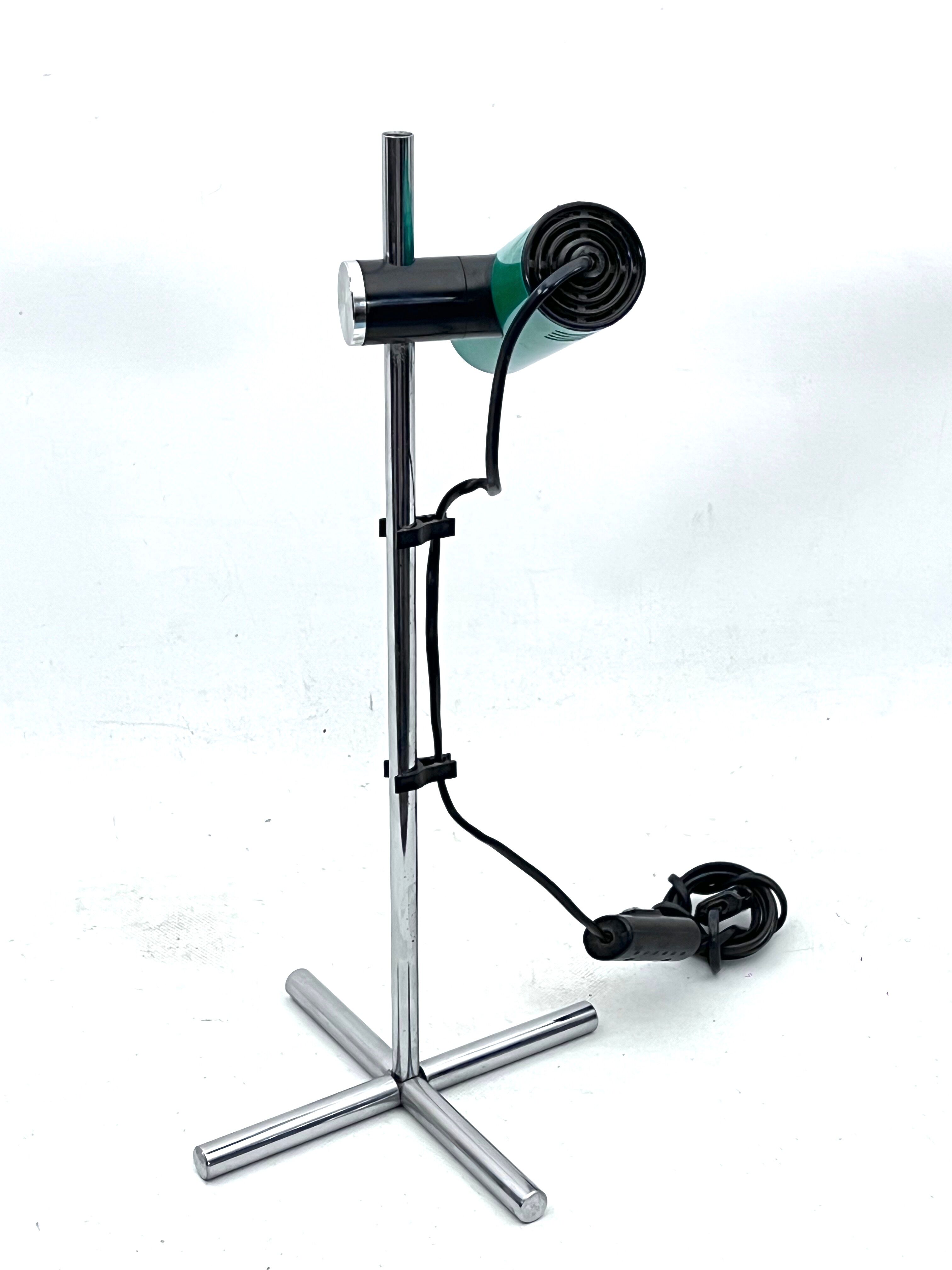 Reggiani, vintage chrome and green lacquer adjustable table lamp. Italy 1970s