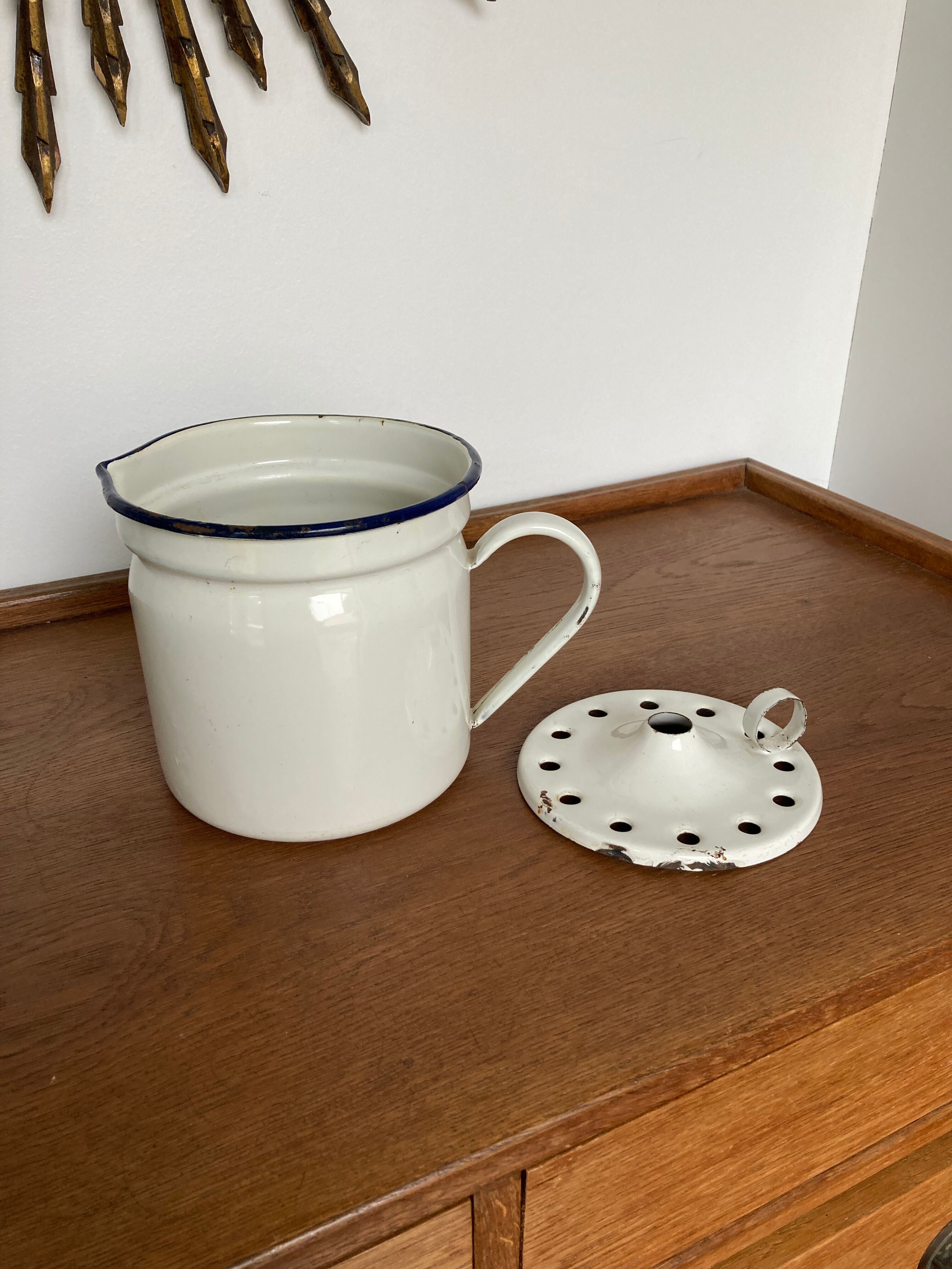 Vintage enamelled iron pitcher