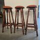 3 high stools in wood and leather
