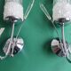 Pair of vintage tulip shaped globe chrome wall sconces