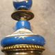 Pair of xixth candle holders, in bronze and enamelled porcelain