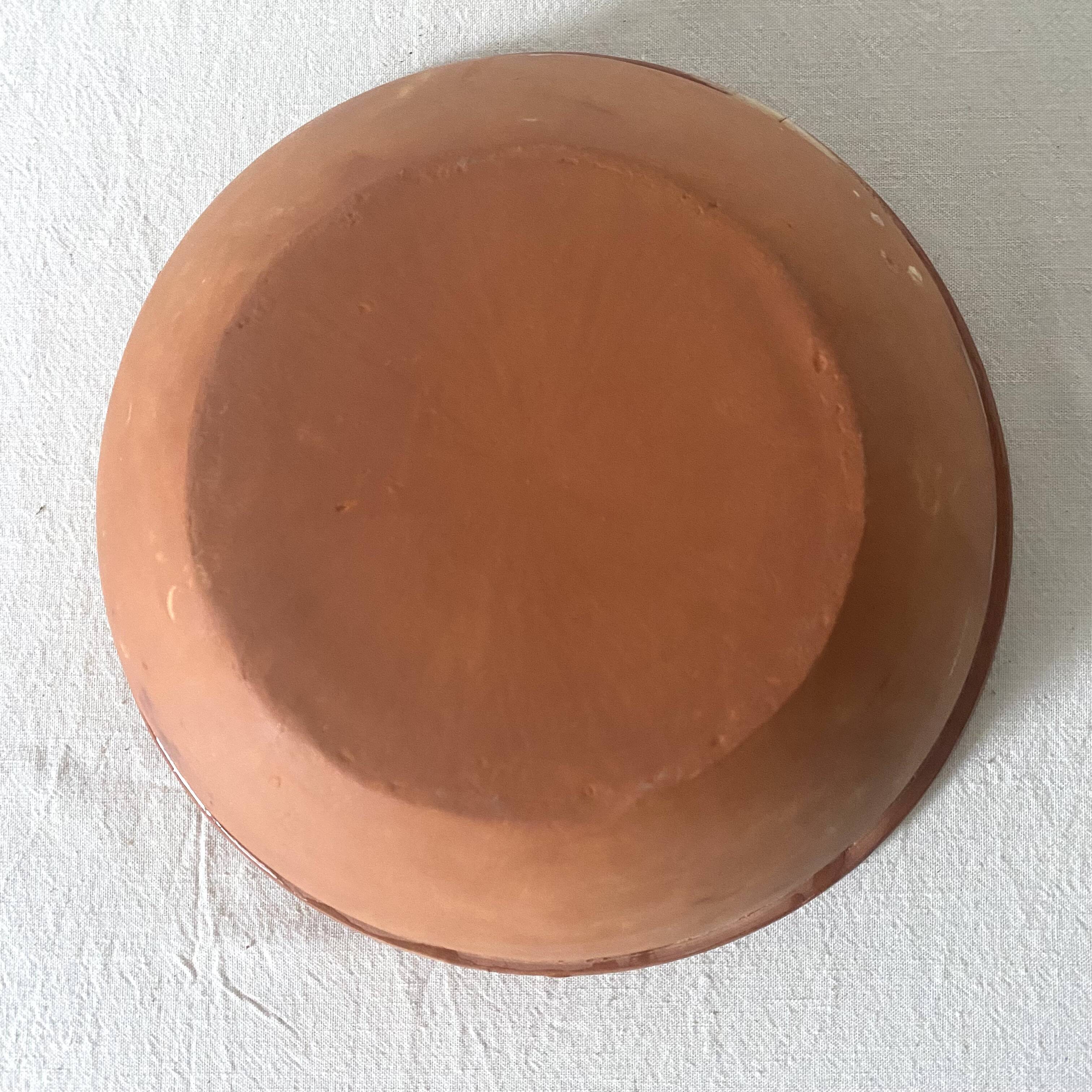 Terracotta salad bowl with flower decoration
