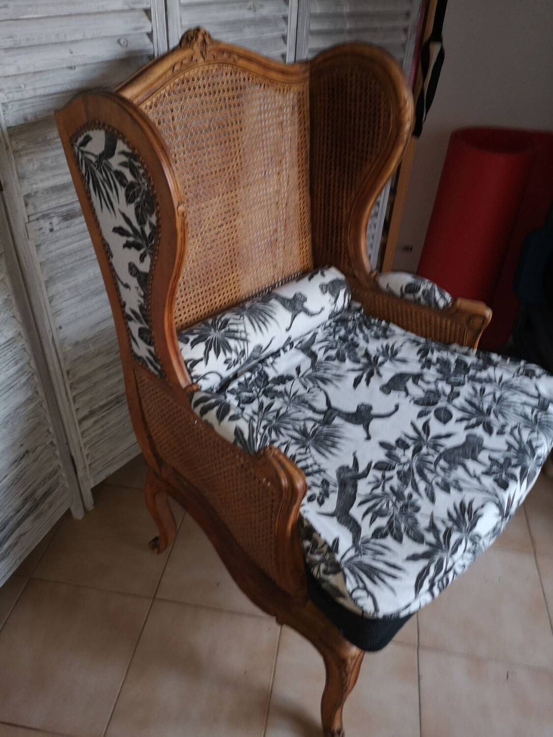 Antique wingback armchair
