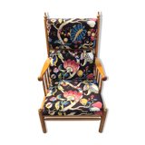 Fauteuil scandinave tissu imprimé fleurs sur fond noir