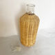 Rattan carafe