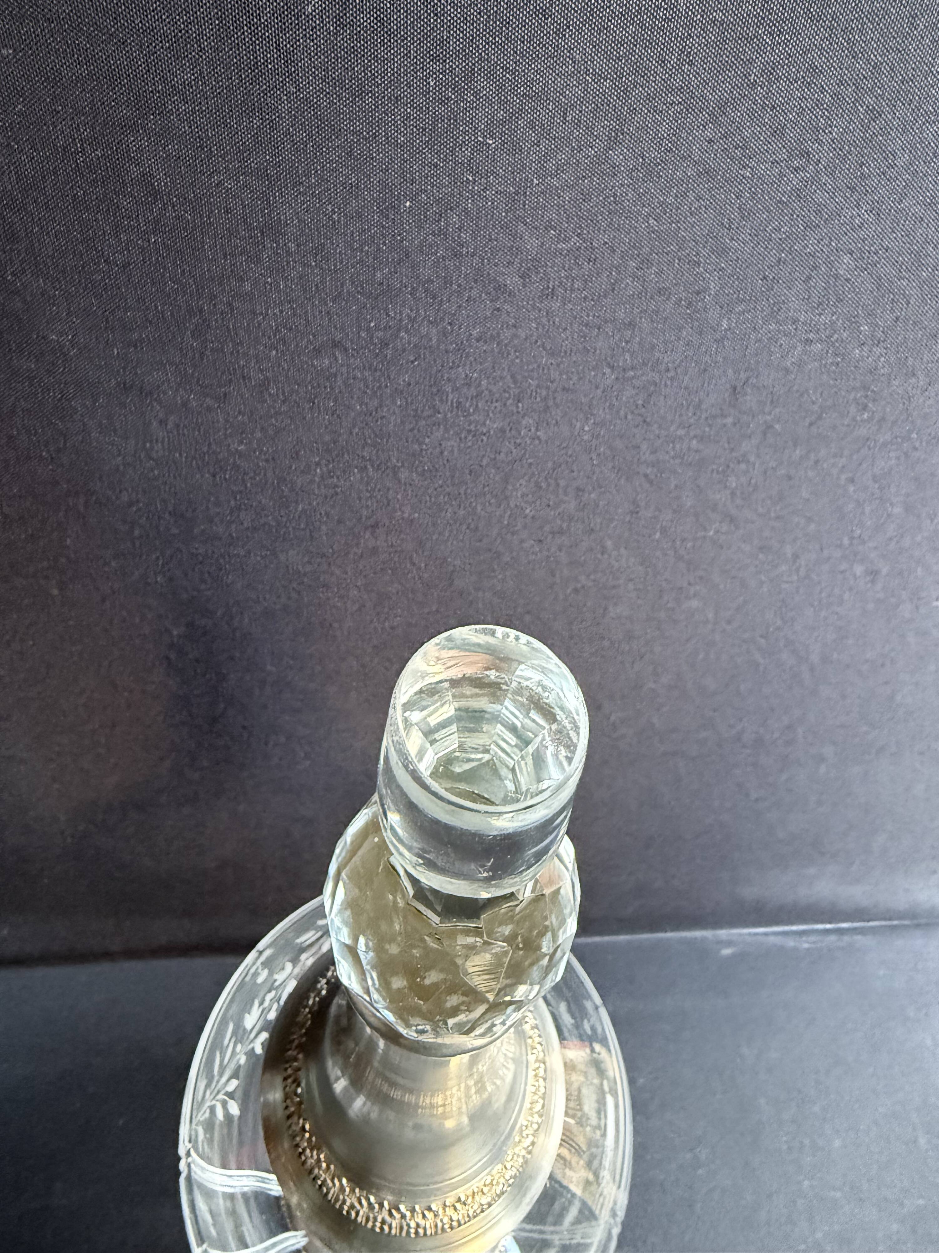 Cut crystal carafe with silver frame