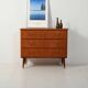 Scandinavian teak and mahogany chest with brass accents