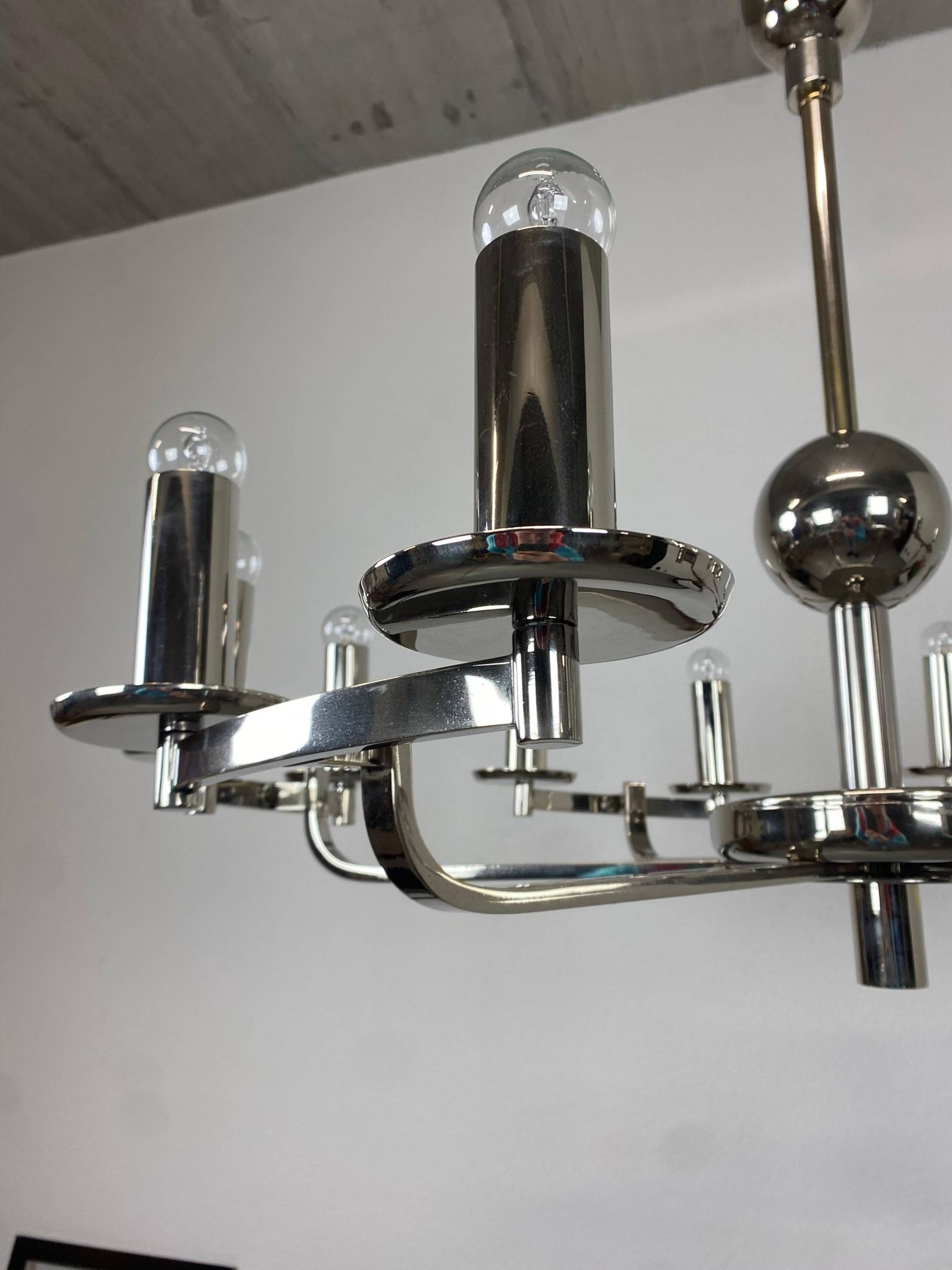 Large Bauhaus chandelier with two wall sconces.
