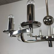 Large Bauhaus chandelier with two wall sconces.